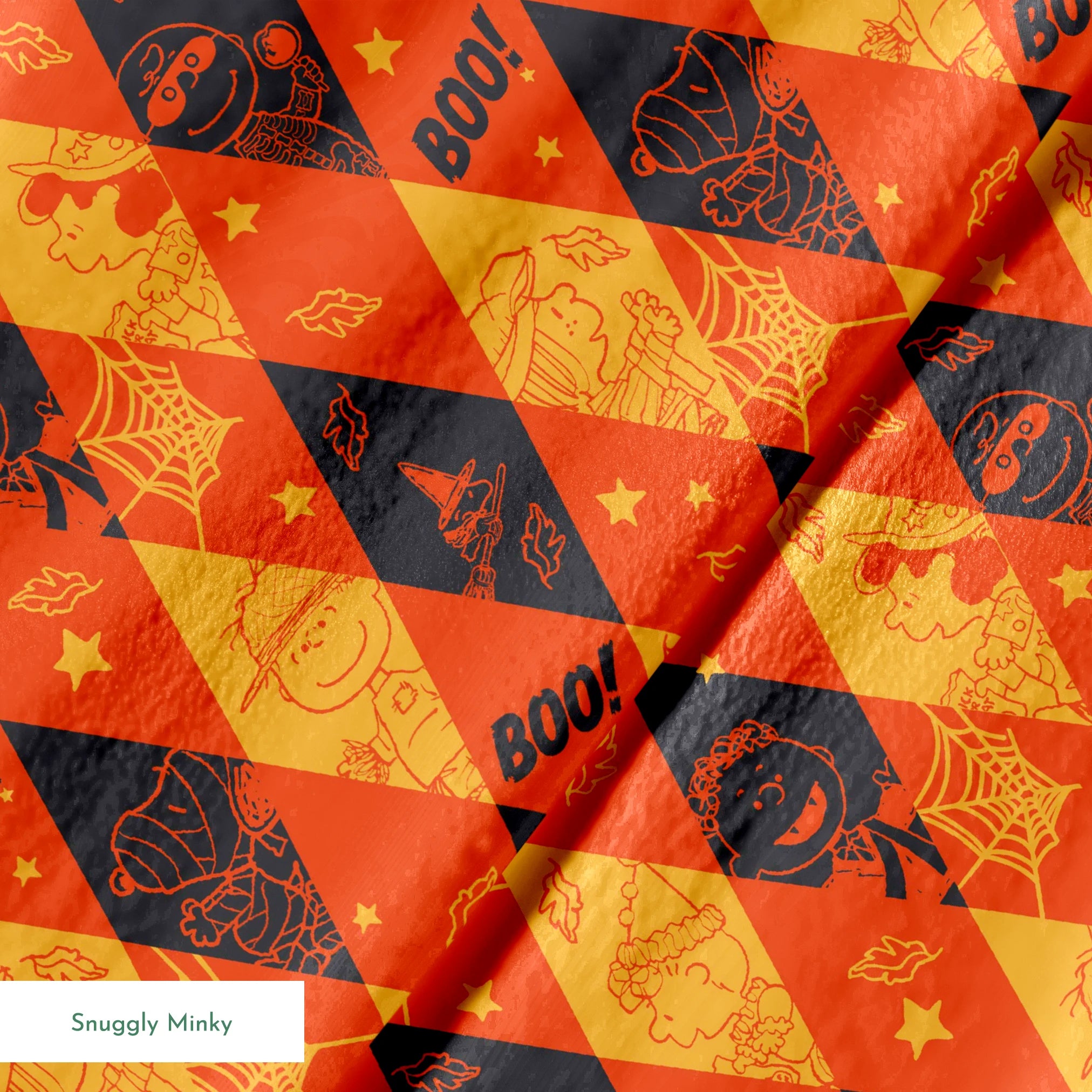 Peanuts Halloween pattern with diamond shapes in orange, yellow, and black featuring Peanuts characters in costumes, webs, "BOO!" text, and seasonal decorations springs minky texture