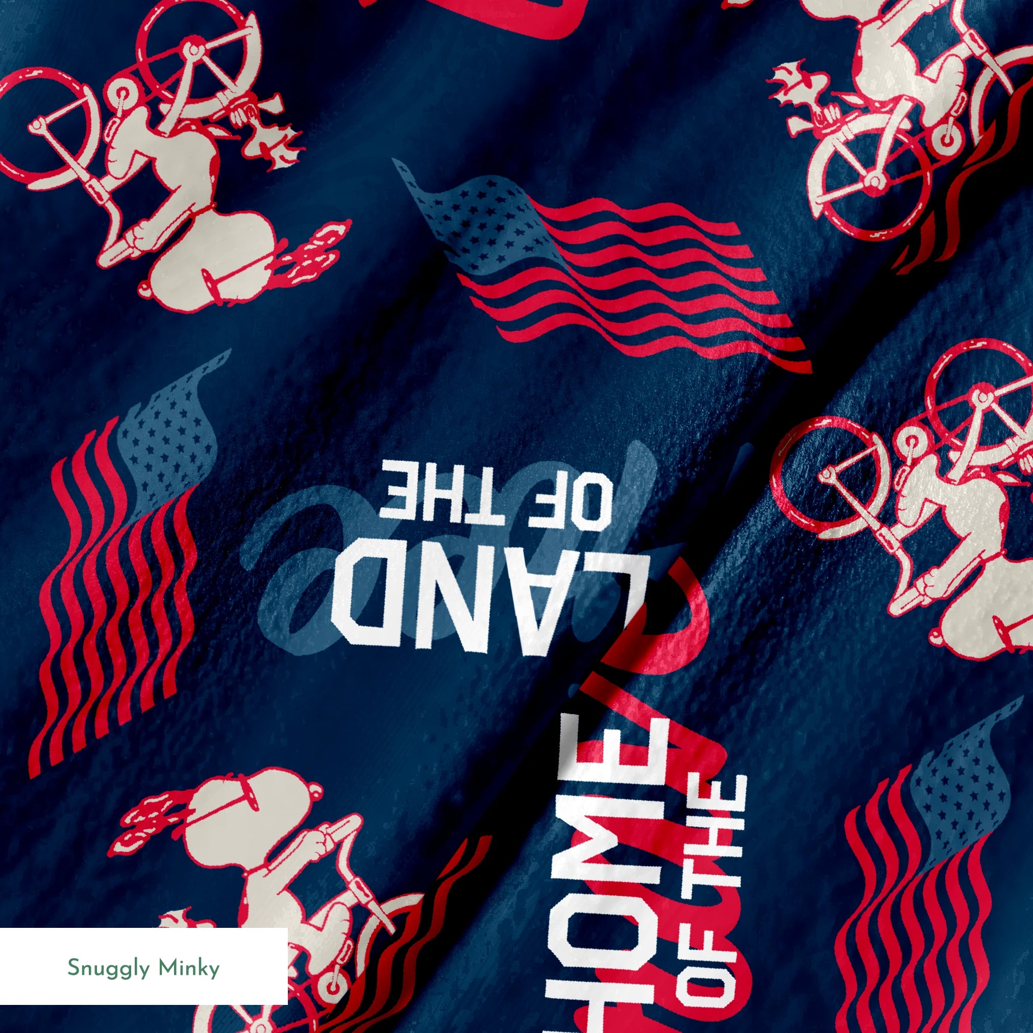 Repeating Peanuts "Home of the Brave" text pattern with bicycles on navy blue background with red wavy lines springs minky texture