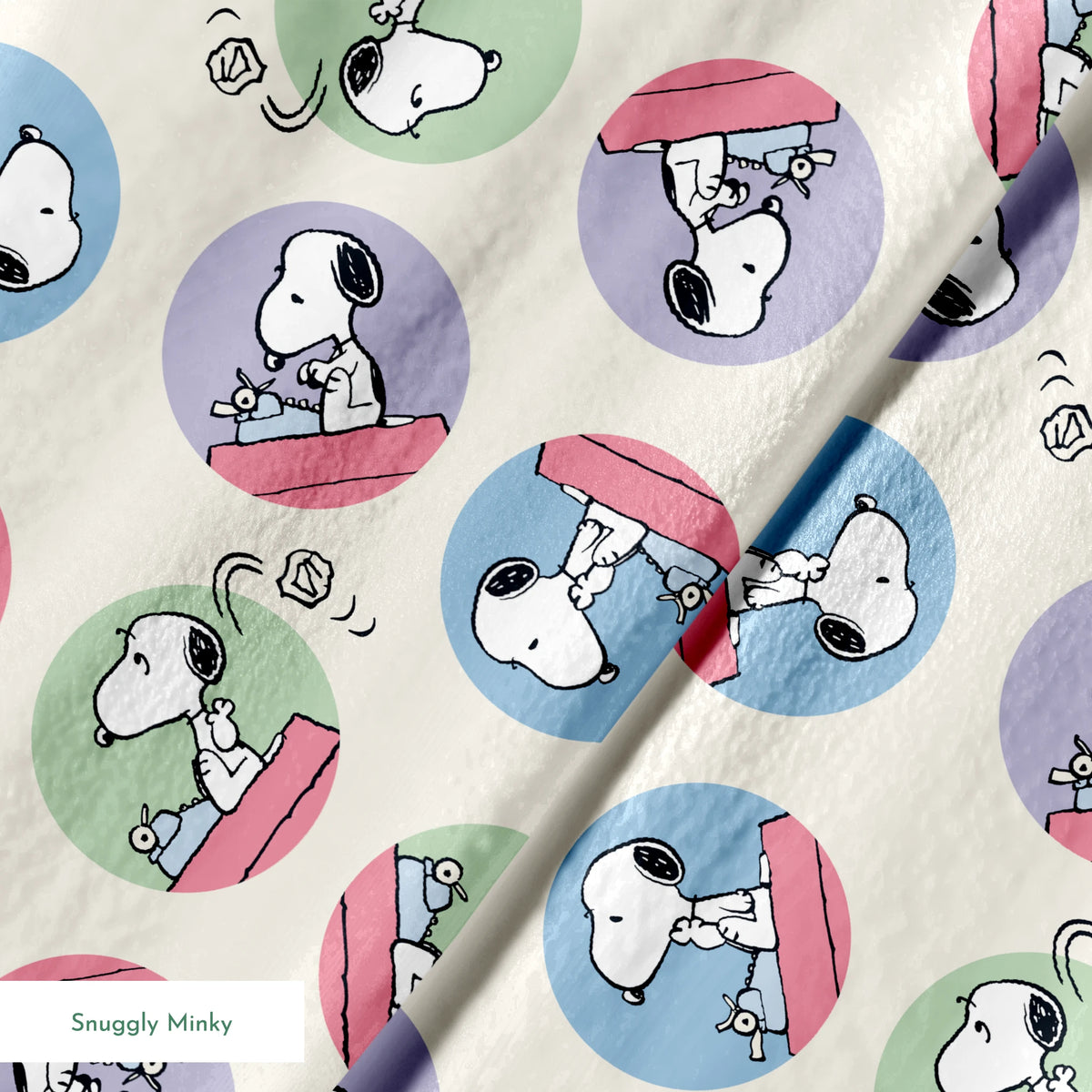 Cartoon Snoopy pattern with the beagle character in circular frames of blue, green, and purple backgrounds springs minky texture