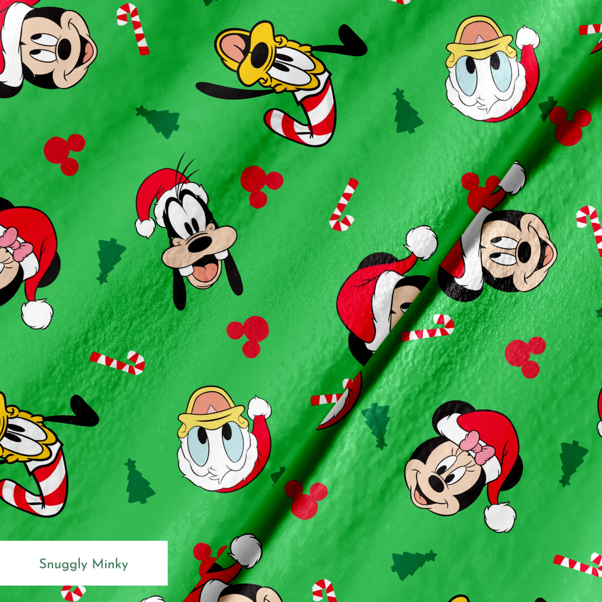 Disney Mickey Mouse characters in Santa hats on green background with candy canes and Christmas trees springs minky texture