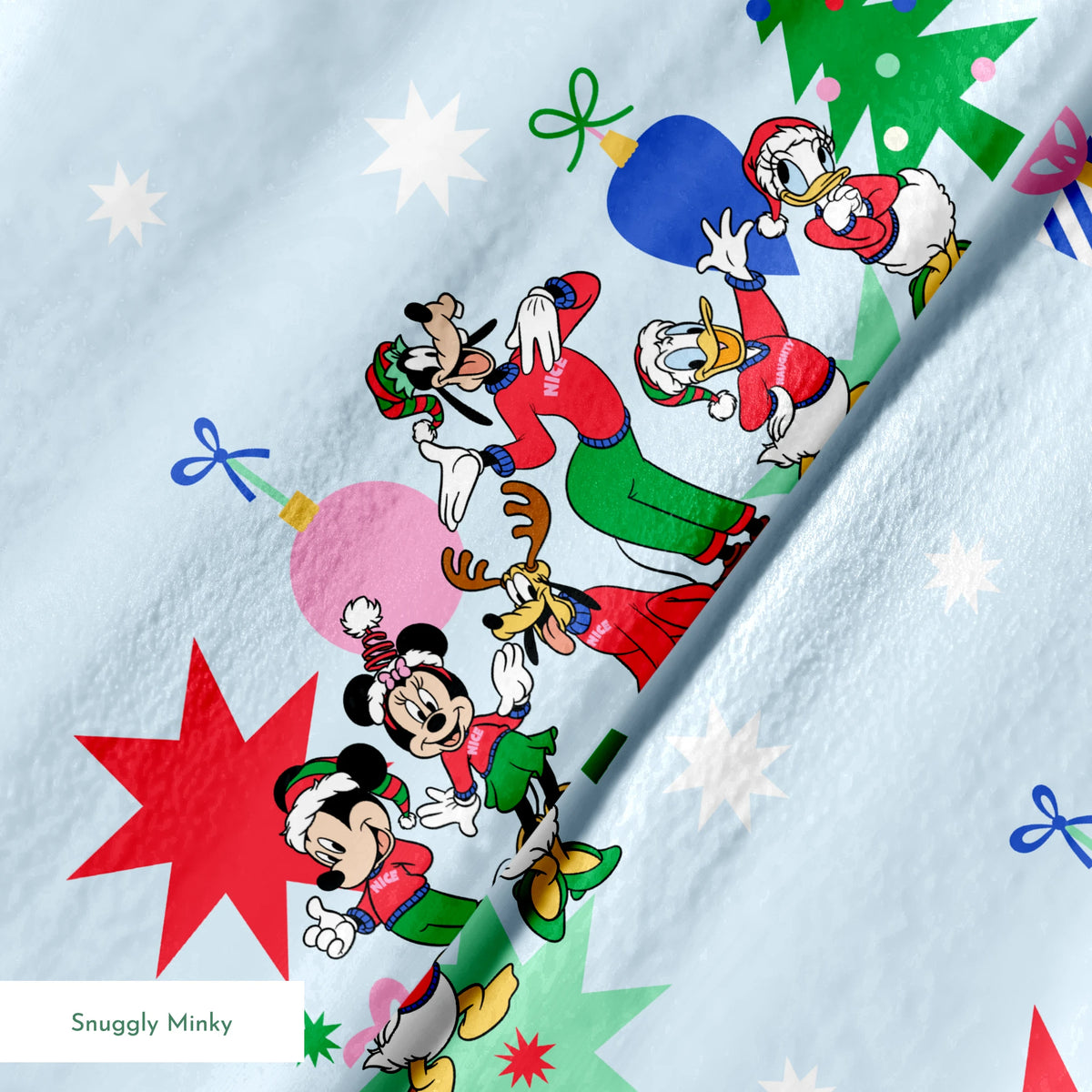 Cartoon Disney characters in festive poses with Christmas trees, ornaments, and stars on light blue snowy background springs minky texture