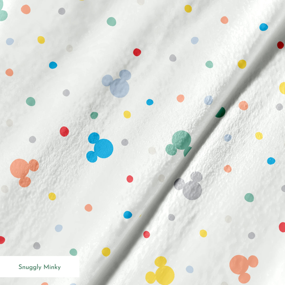 Colorful Disney Mickey Mouse silhouette pattern with pastel dots on white background springs minky texture