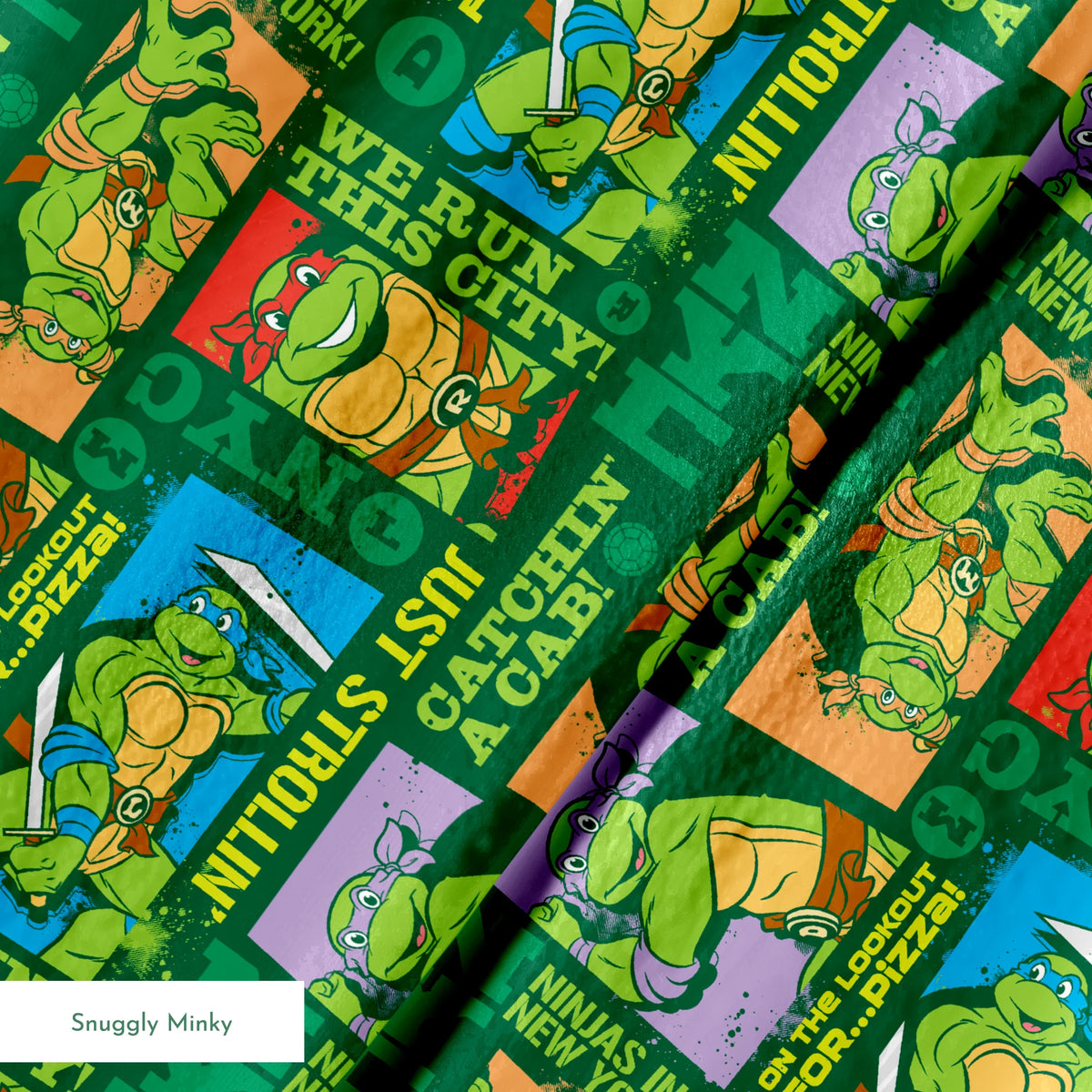 Teenage Mutant Ninja Turtles comic-style panels with phrases like "Catchin' a cab!" and "On the lookout for pizza!" on green background springs minky texture