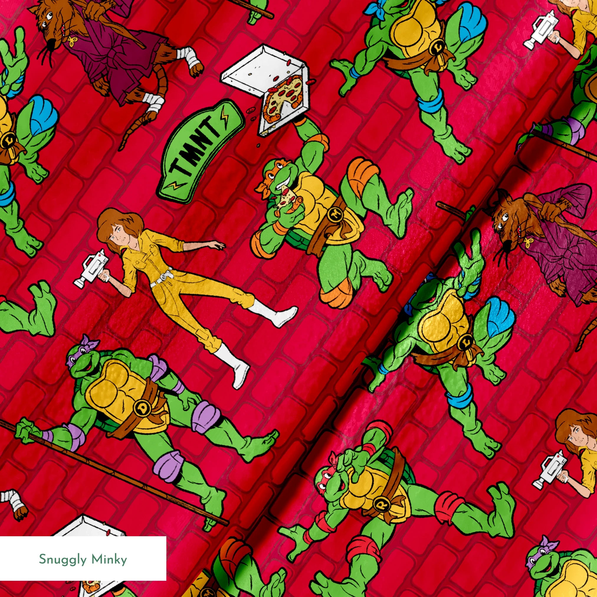 Teenage Mutant Ninja Turtles pattern on red background with green turtle characters in action poses springs minky texture