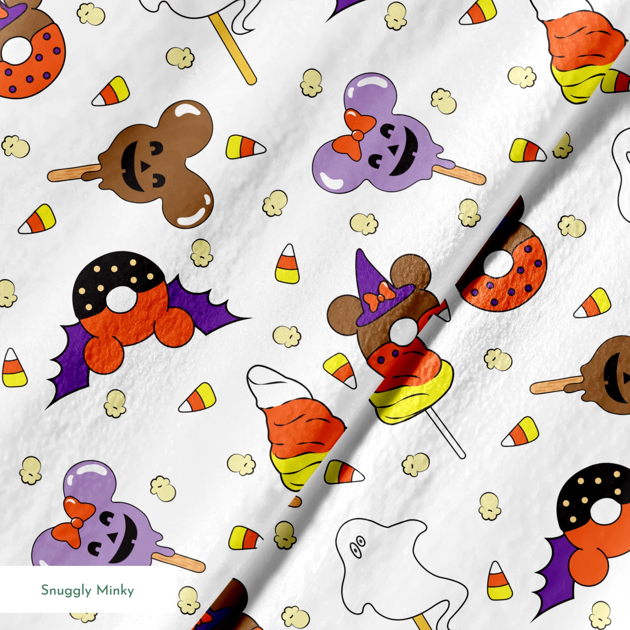 Disney Halloween themed pattern with candy lollipops, ghost, bats, and candy corn springs minky texture