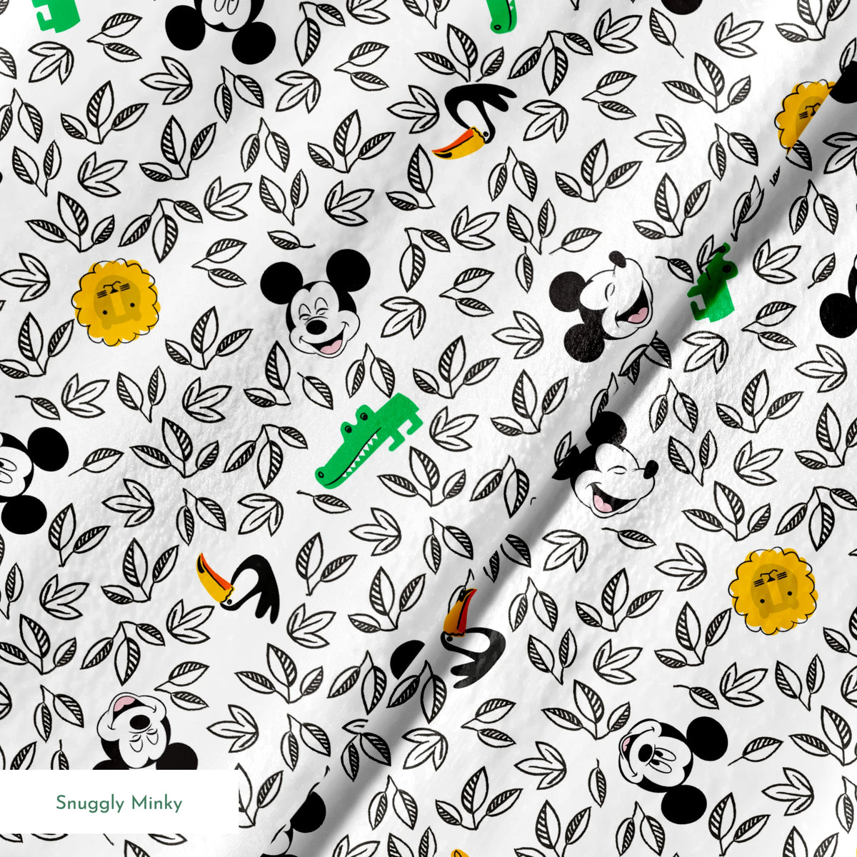 Pattern of cartoon Mickey Mouse silhouettes with yellow honeycomb, green bamboo, and black and white leaves springs minky texture
