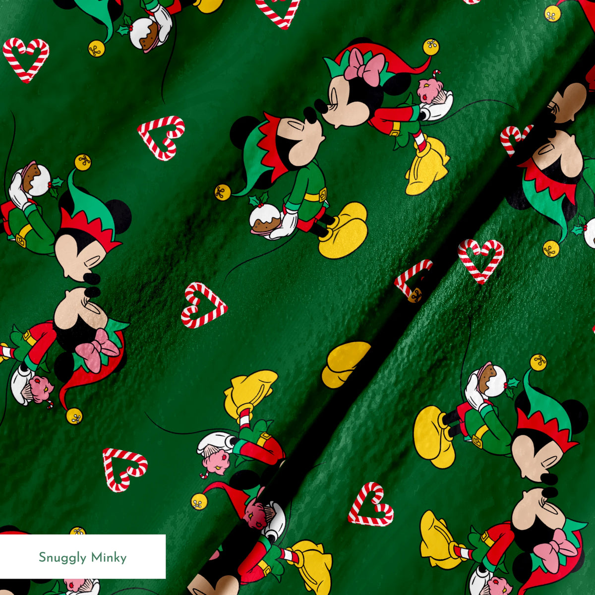 Festive Mickey Mouse pattern with candy canes on green background springs minky texture