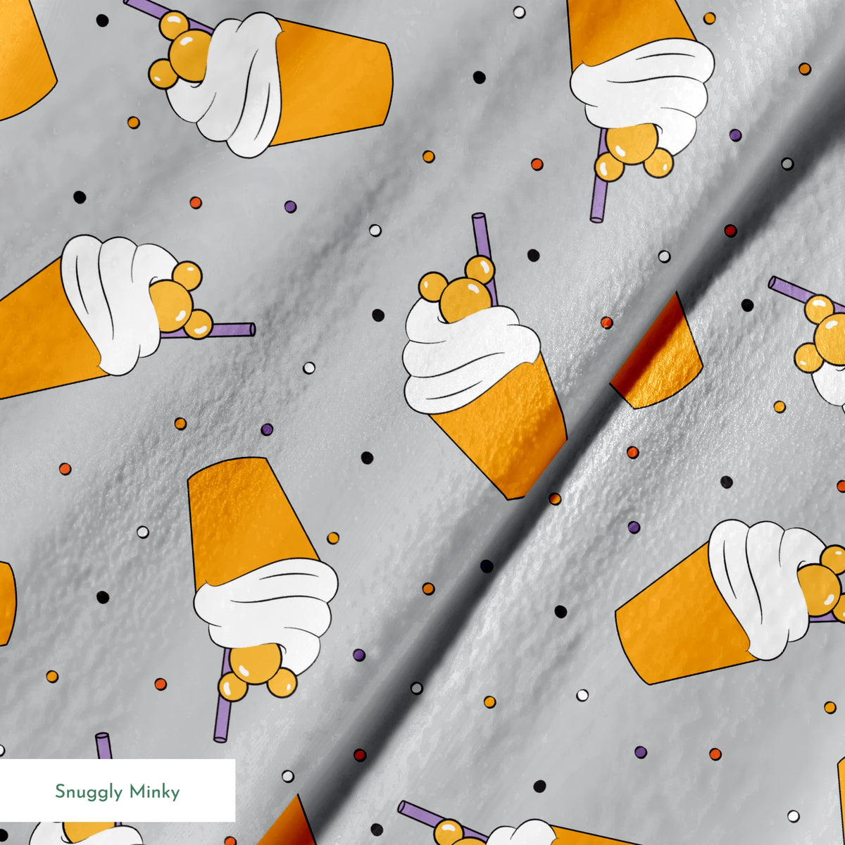 Orange Disney-inspired drinks with whipped cream and purple straws on gray background with colorful dots springs minky texture