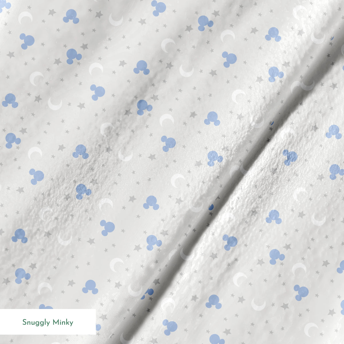 Blue Mickey Mouse silhouettes with white moons and gray stars on light gray background springs minky texture