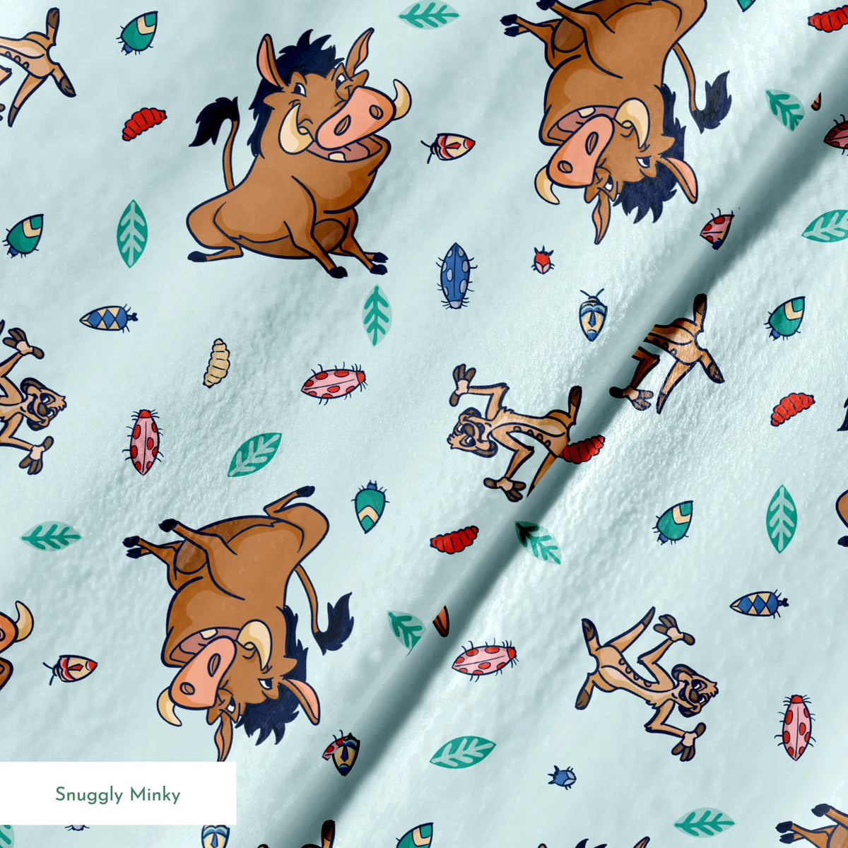 Lion King characters and colorful leaves scattered on light blue background in playful pattern springs minky texture