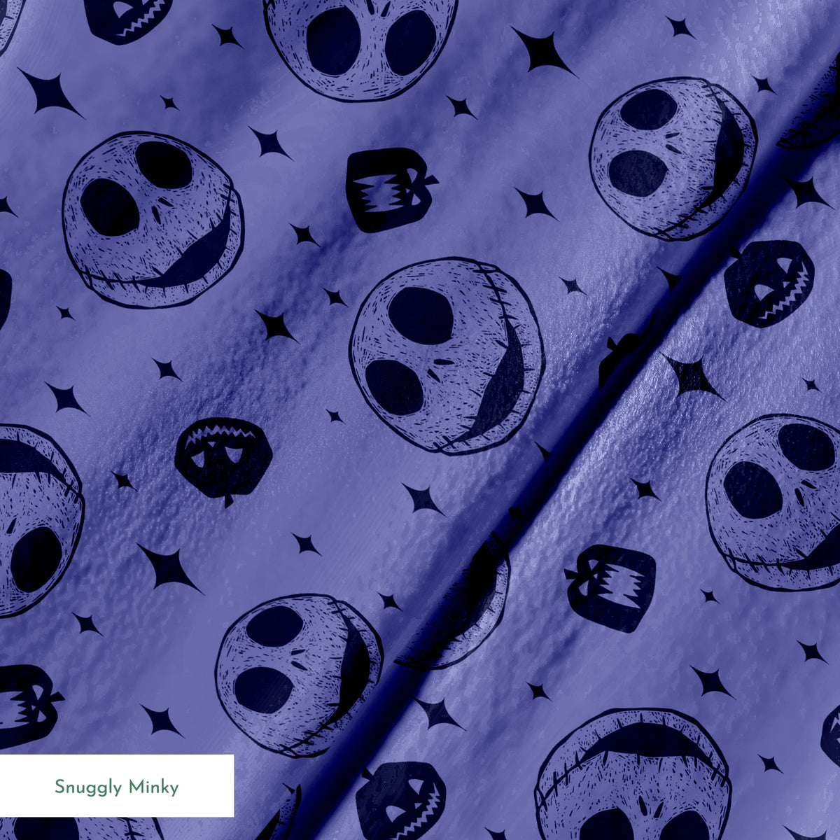 Nightmare Before Christmas skull and pumpkin pattern on purple background with black star shapes springs minky texture