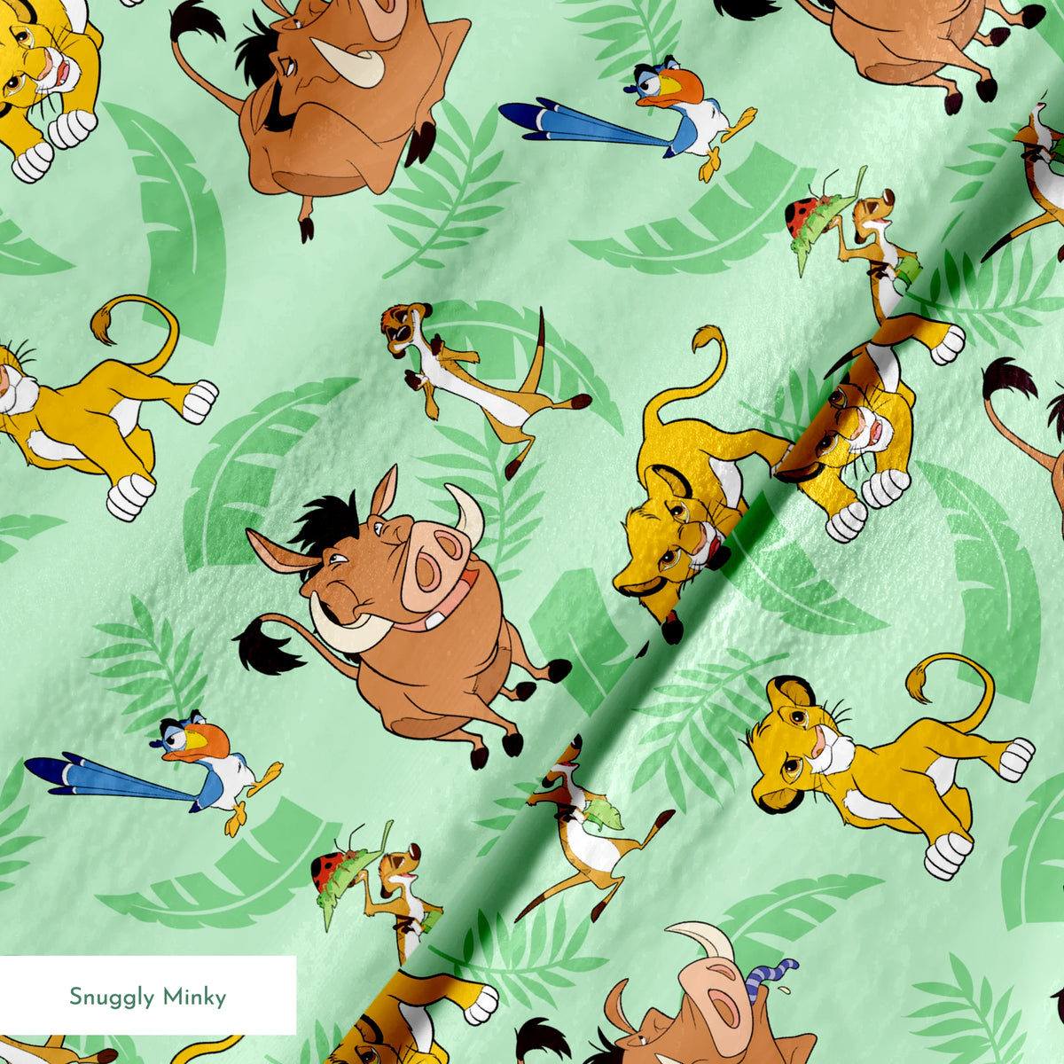 A repeating pattern of Lion King characters - Simba, Timon, Pumbaa, and Zazu on a light green leafy background. springs minky texture