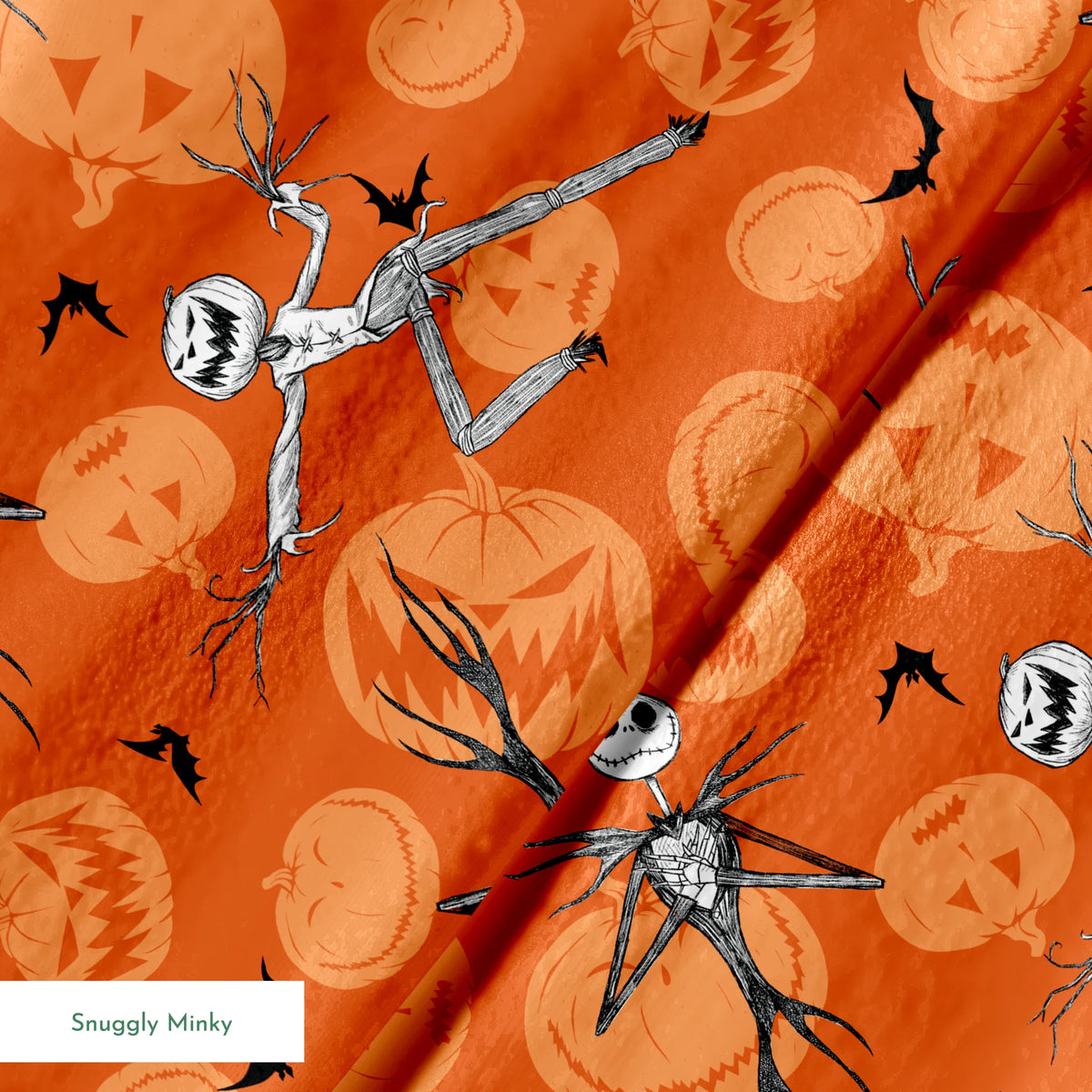 Nightmare Before Christmas pattern with Jack Skellington, bats, and jack-o'-lantern silhouettes on orange background springs minky texture