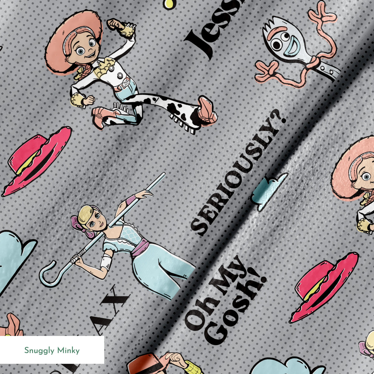 Toy Story character pattern with Buzz, Woody and aliens on gray background with phrases like "Good Vibes" and "Galaxy Hoppin' springs minky texture
