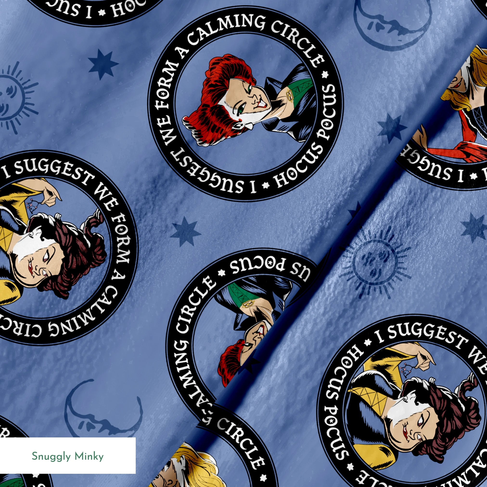 Cartoon witches in circular emblems with "Hocus Pocus" text on blue background with stars springs minky texture