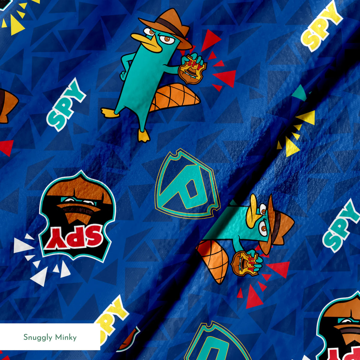 Colorful Perry the Platypus pattern with "SPY" text on blue geometric background springs minky texture
