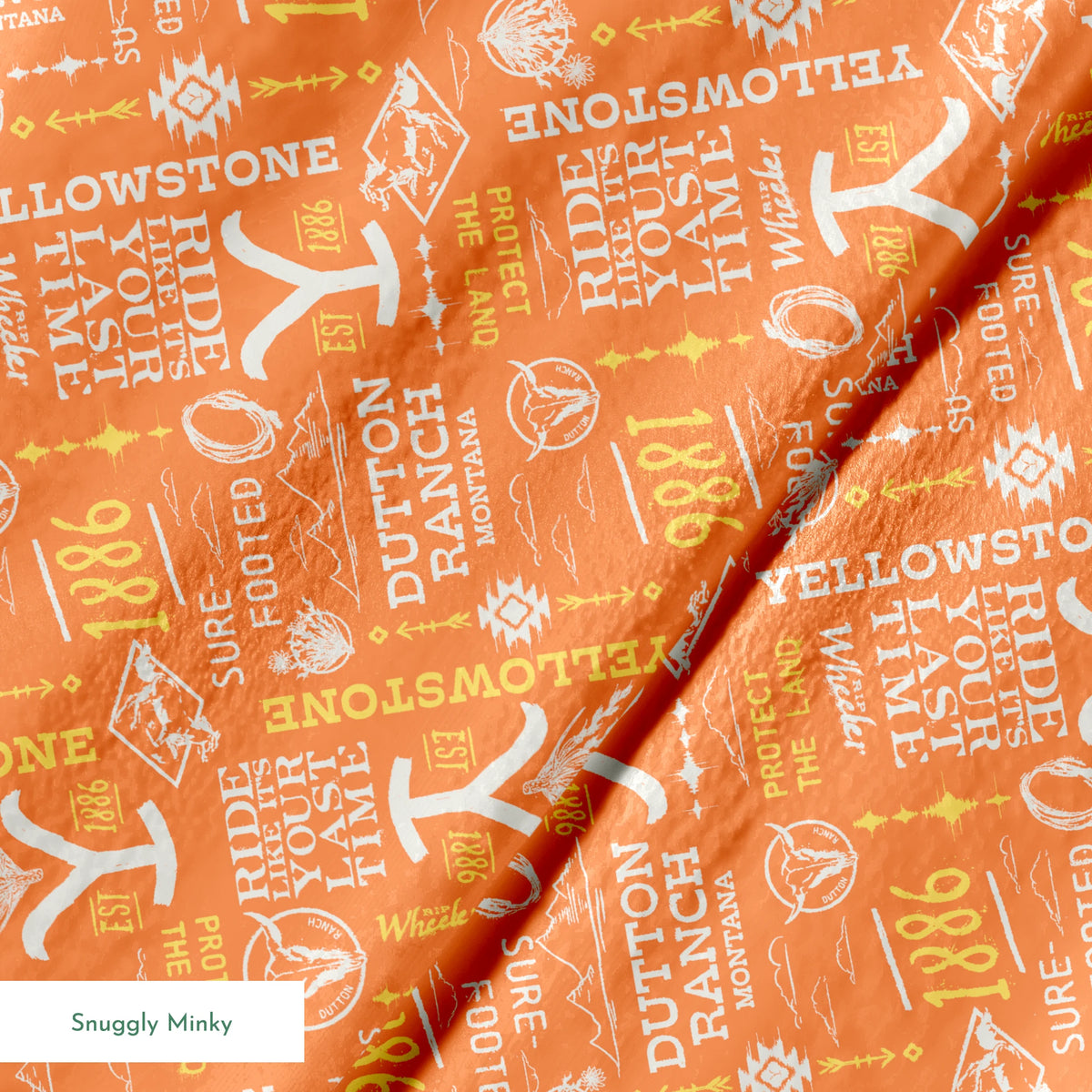 Paramount Yellowstone Verbiage Collage on Orange Fabric
