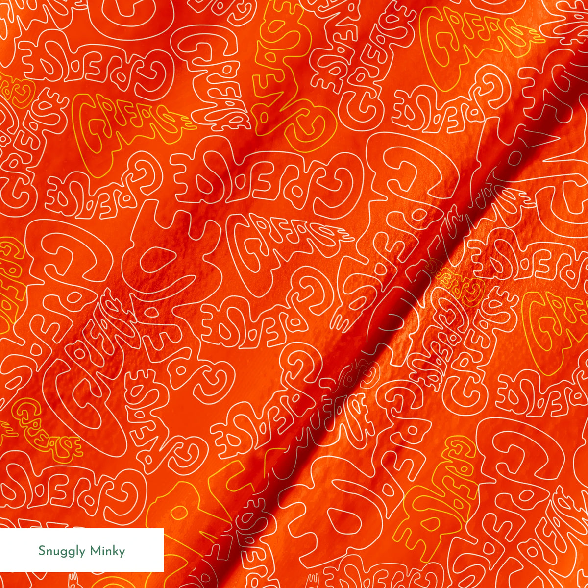 Paramount Grease Title Toss on Orange Fabric