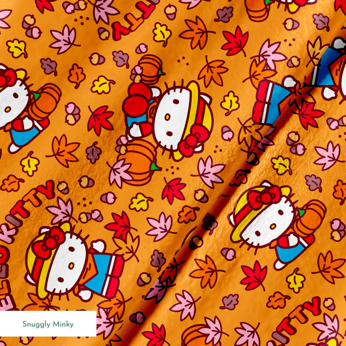 Hello Kitty® Autumn Leaves on Orange Fabric
