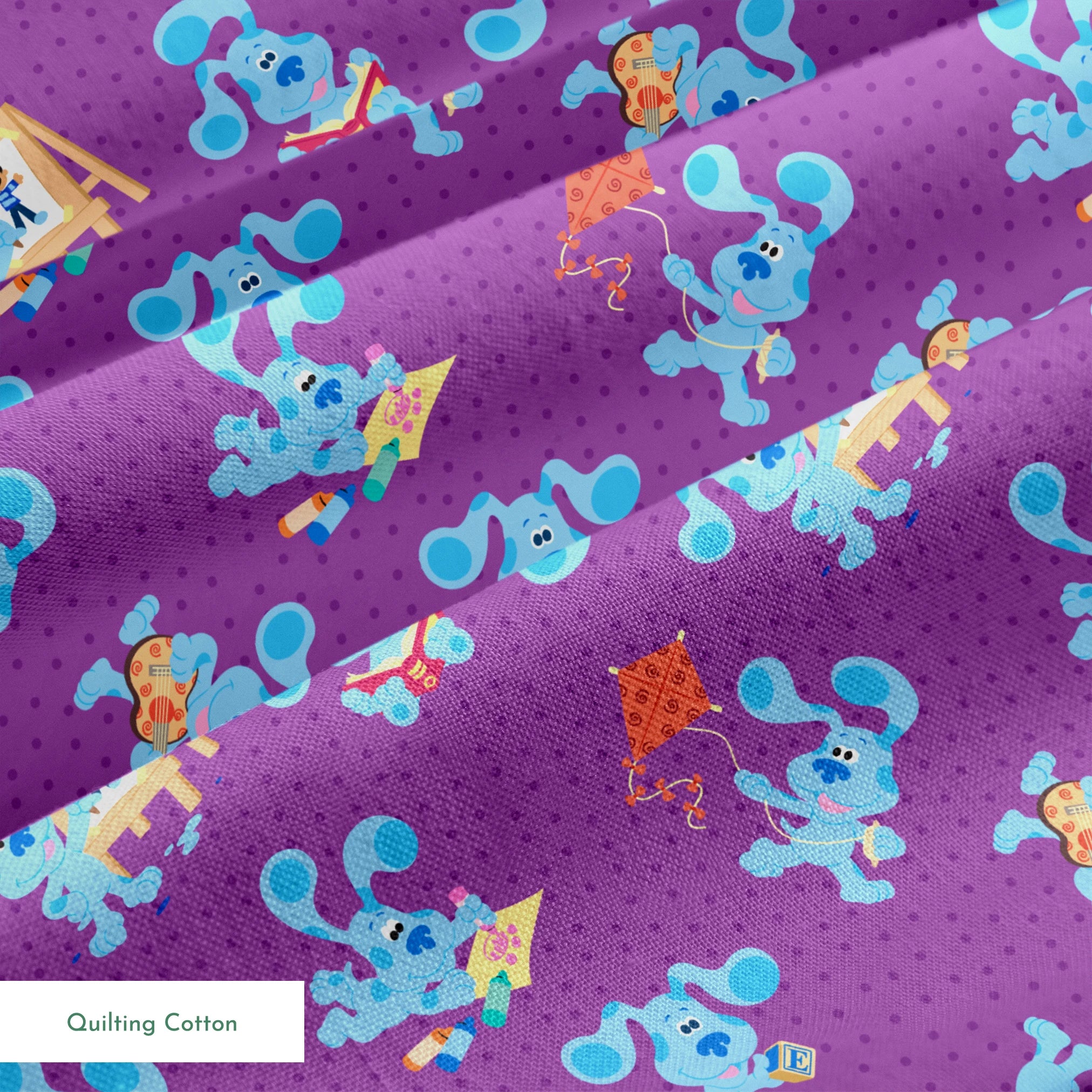 Blue cartoon dog characters on purple polka dot background with toys and alphabet blocks pattern springs quiltingcotton texture