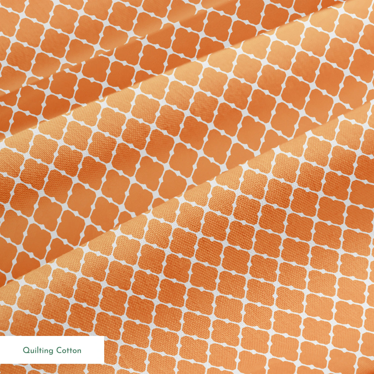 Geometric orange and white pattern with quatrefoil shapes forming a lattice design springs quiltingcotton texture