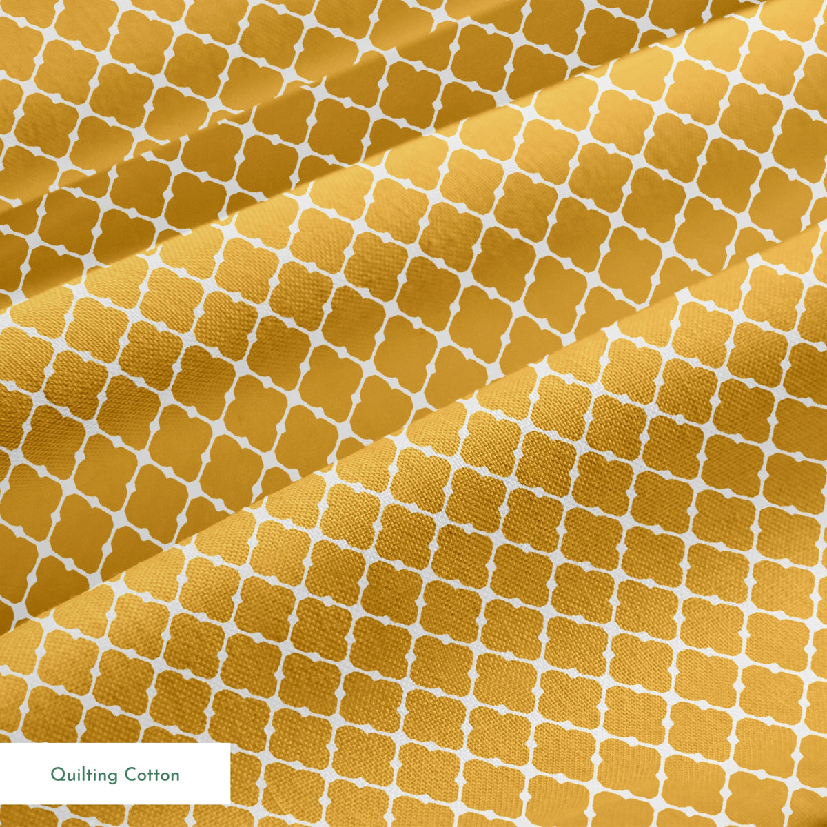 Gold quatrefoil pattern on white background, forming a geometric Moroccan-style lattice design springs quiltingcotton texture