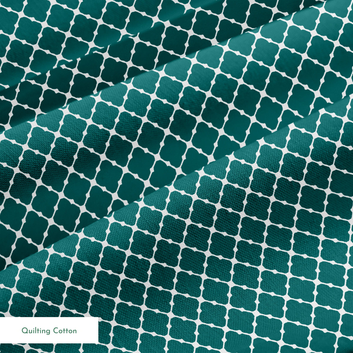 Dark teal quatrefoil pattern with white lattice outlines on a geometric background springs quiltingcotton texture