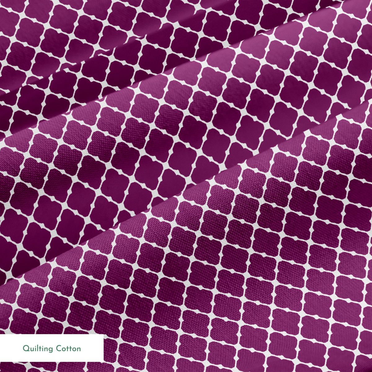 Plum quatrefoil pattern with white lattice outline on deep plum background springs quiltingcotton texture
