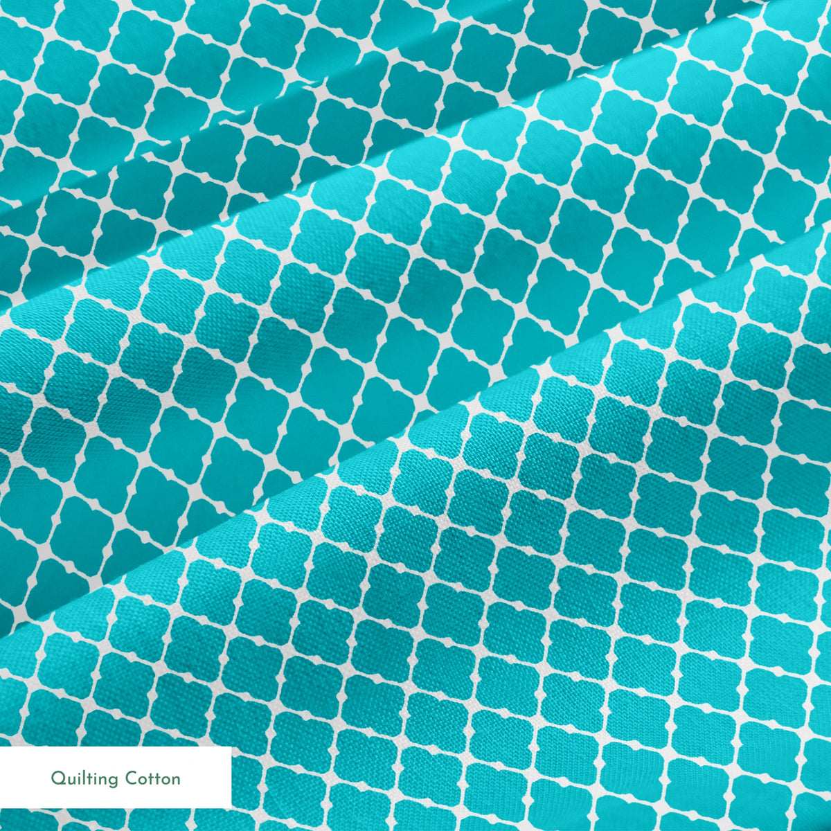 Turquoise and white quatrefoil pattern with Moroccan-inspired geometric design springs quiltingcotton texture