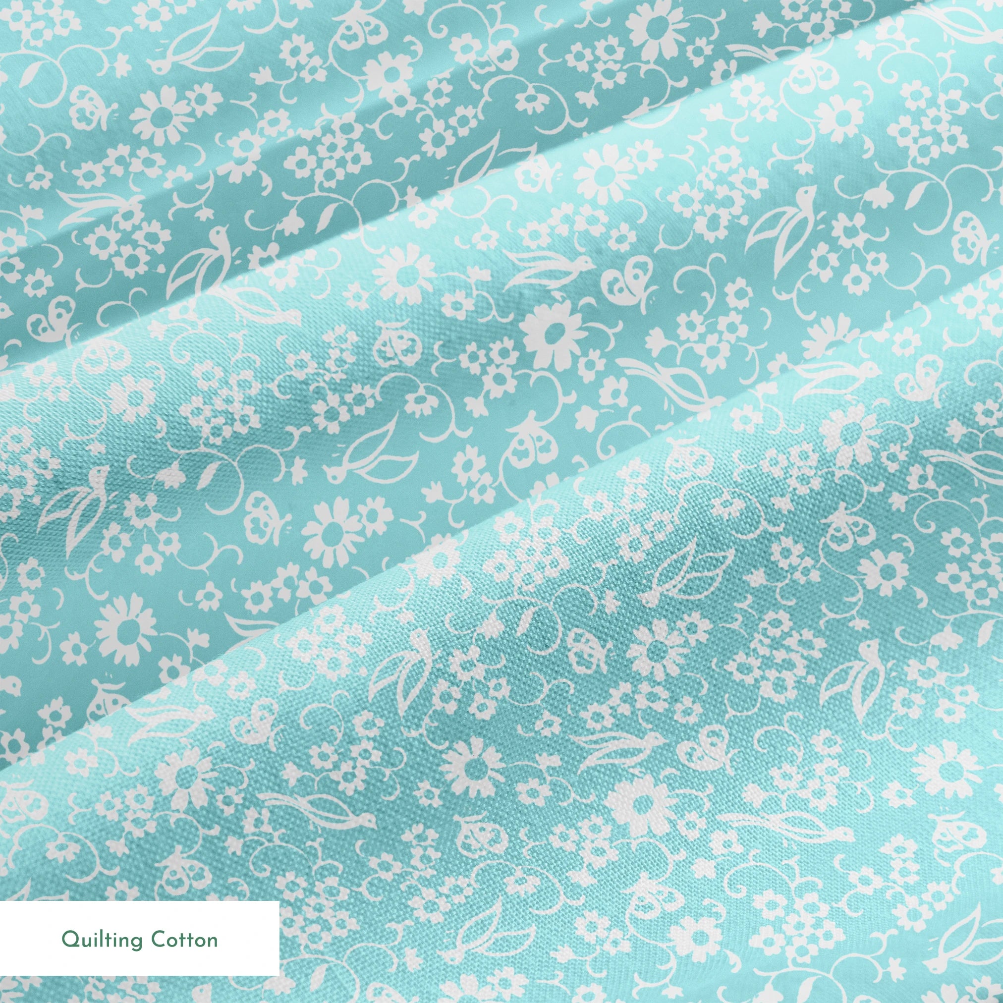 Delicate white floral pattern on a soft turquoise background with swirling leaf motifs springs quiltingcotton texture