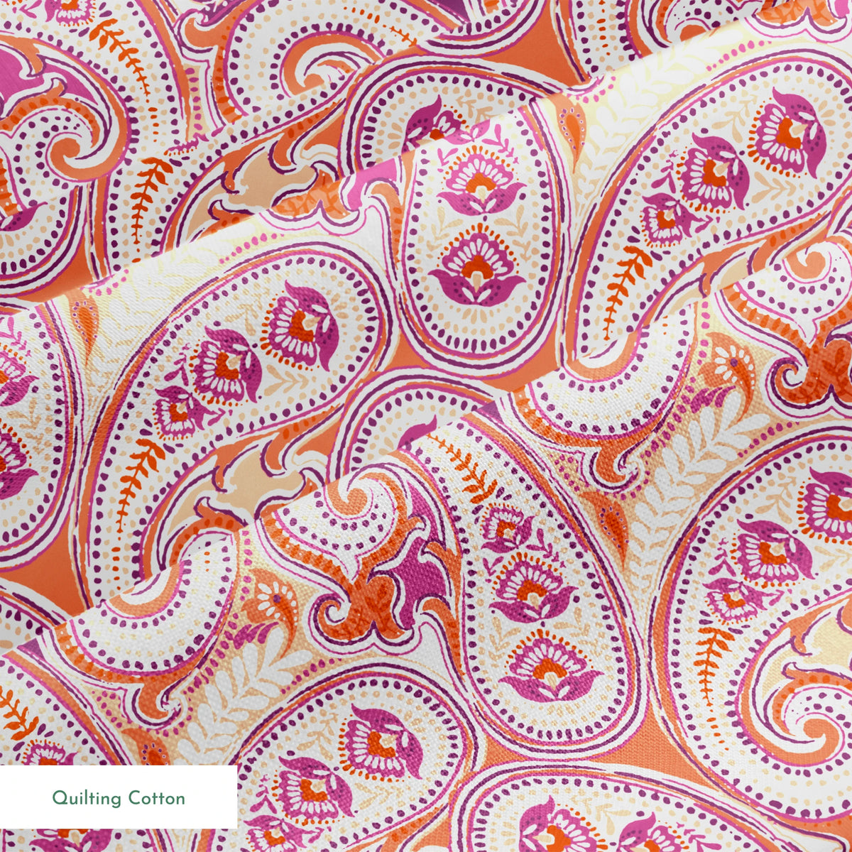 Vibrant paisley pattern in orange, pink and purple with swirling teardrop motifs and ornate details springs quiltingcotton texture