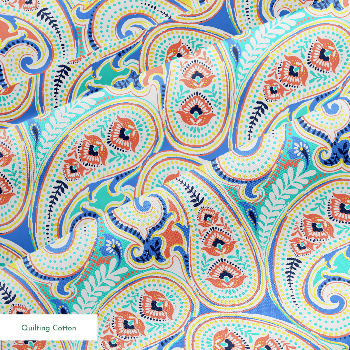 Vibrant blue, yellow and red paisley pattern with swirling decorative motifs and curved shapes springs quiltingcotton texture