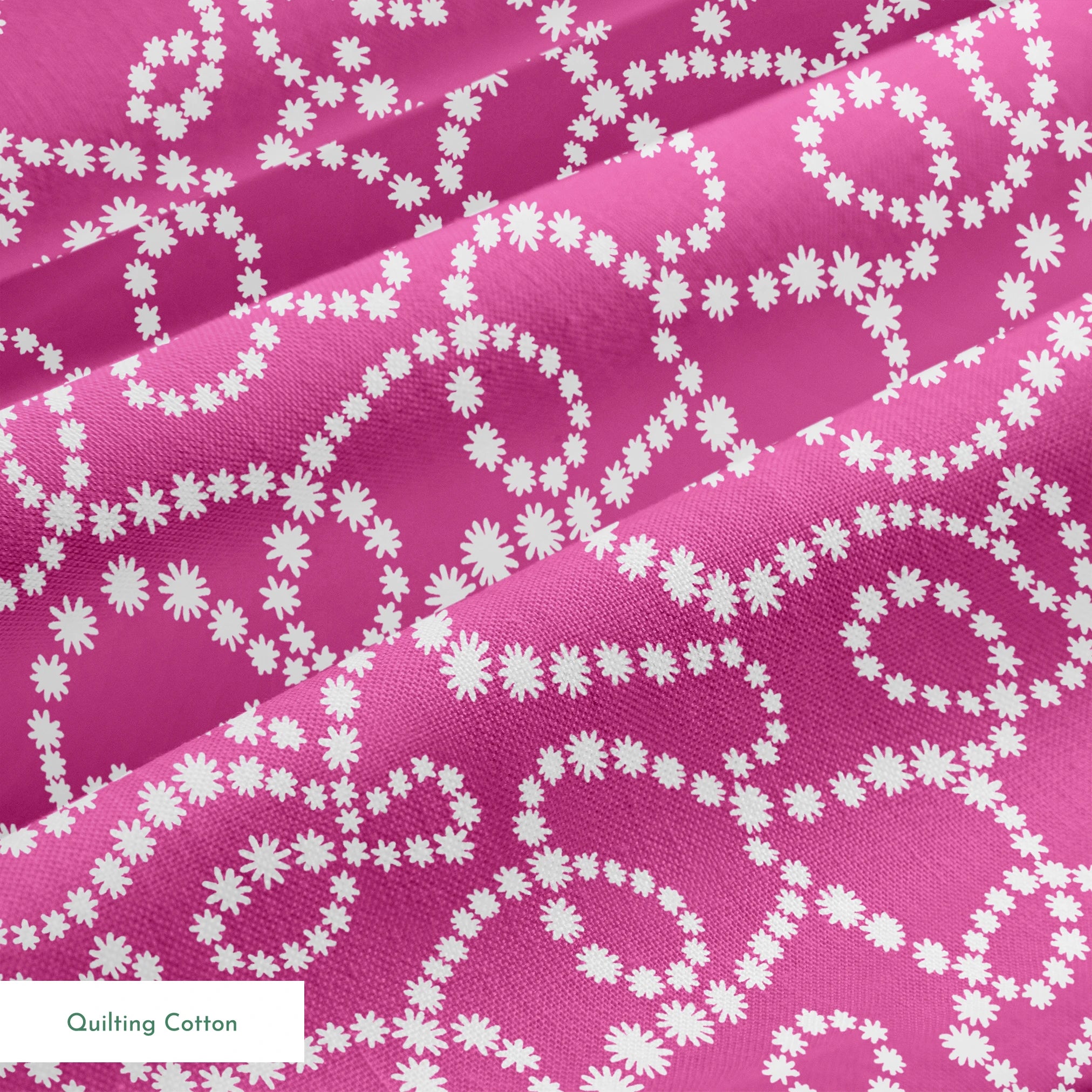 Magenta background with swirling white dotted pattern resembling pearl strands in decorative loops springs quiltingcotton texture
