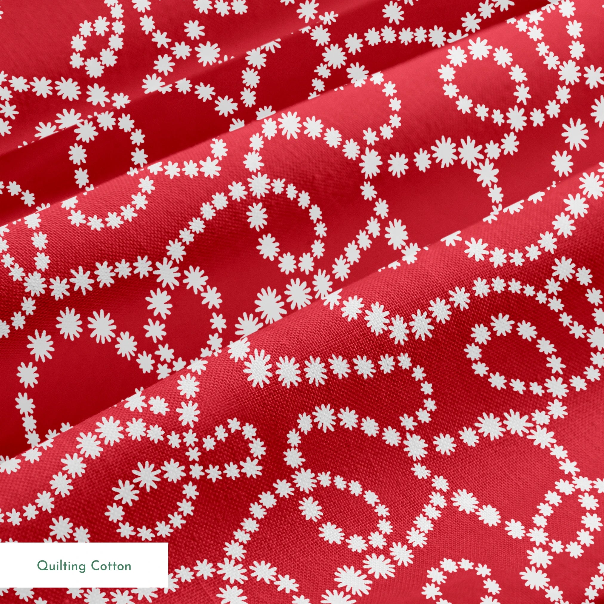 White dotted swirl pattern on rich red background creating decorative curving lines springs quiltingcotton texture