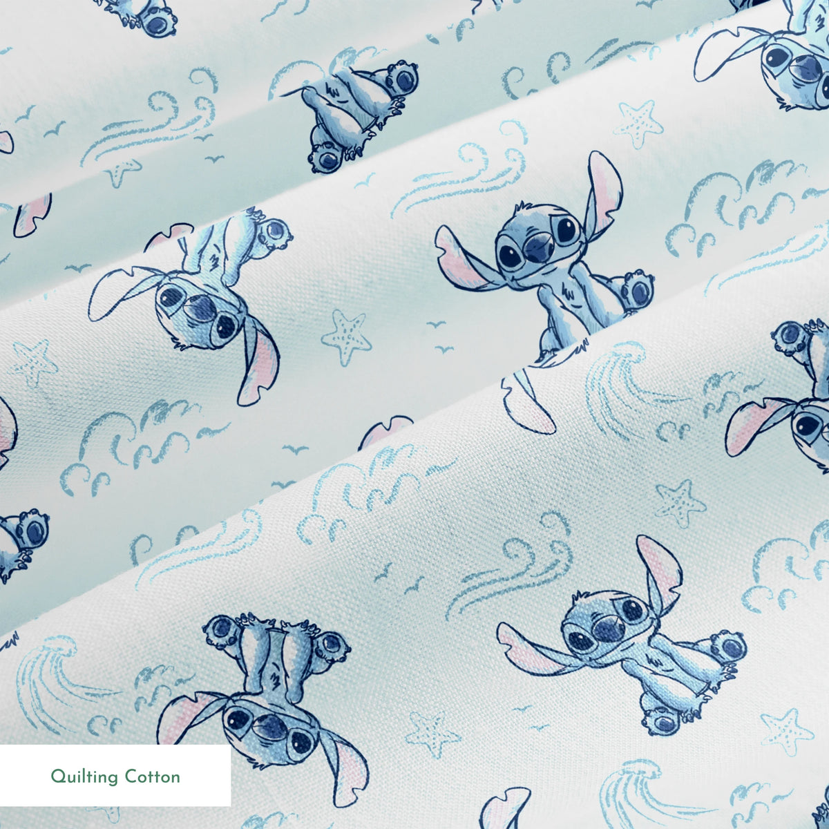 Blue cartoon alien characters with large ears in playful poses against light blue background with swirls and stars pattern springs quiltingcotton texture