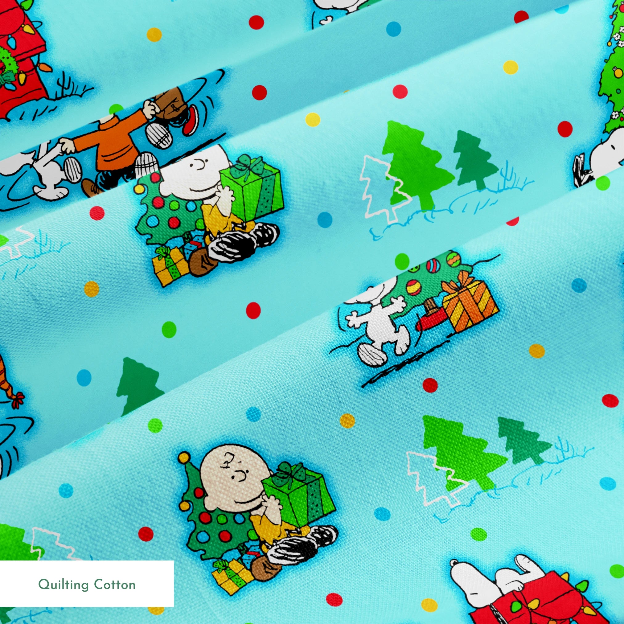 Peanuts Christmas pattern with Snoopy, Charlie Brown, and friends decorating trees on light blue background springs quiltingcotton texture