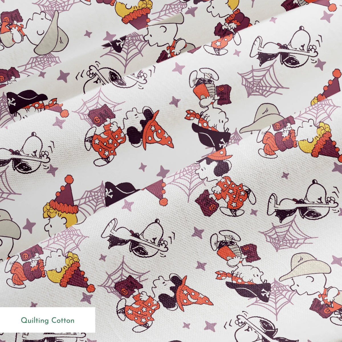 Peanuts characters in Halloween costumes including Snoopy, Charlie Brown, and friends on white background springs quiltingcotton texture