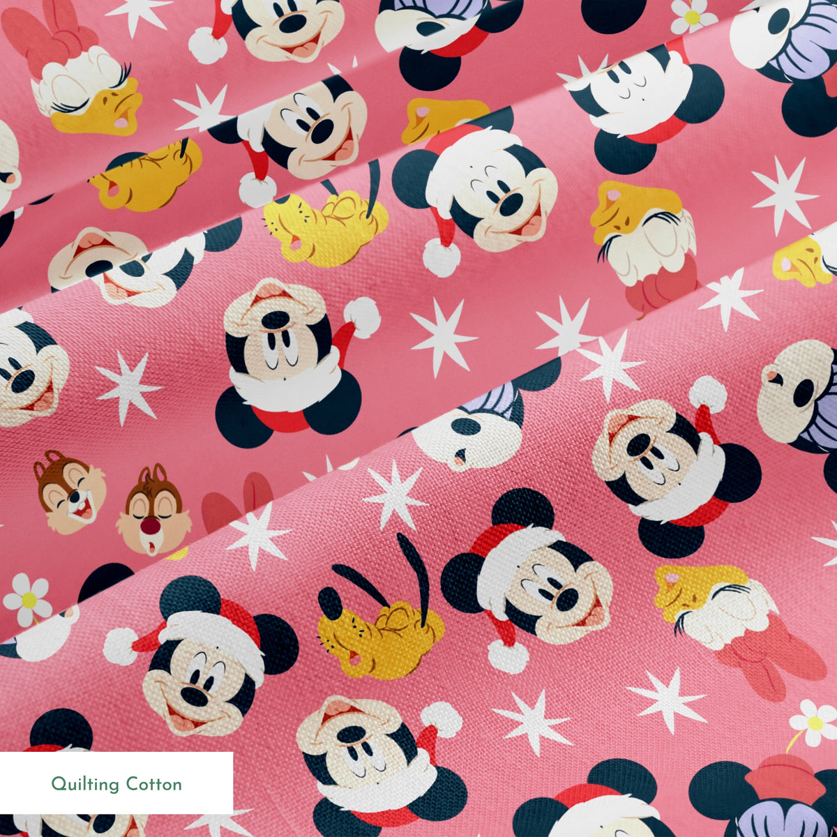 Mickey Mouse pattern with holiday elements on pink background, featuring white stars and gold accents springs quiltingcotton texture