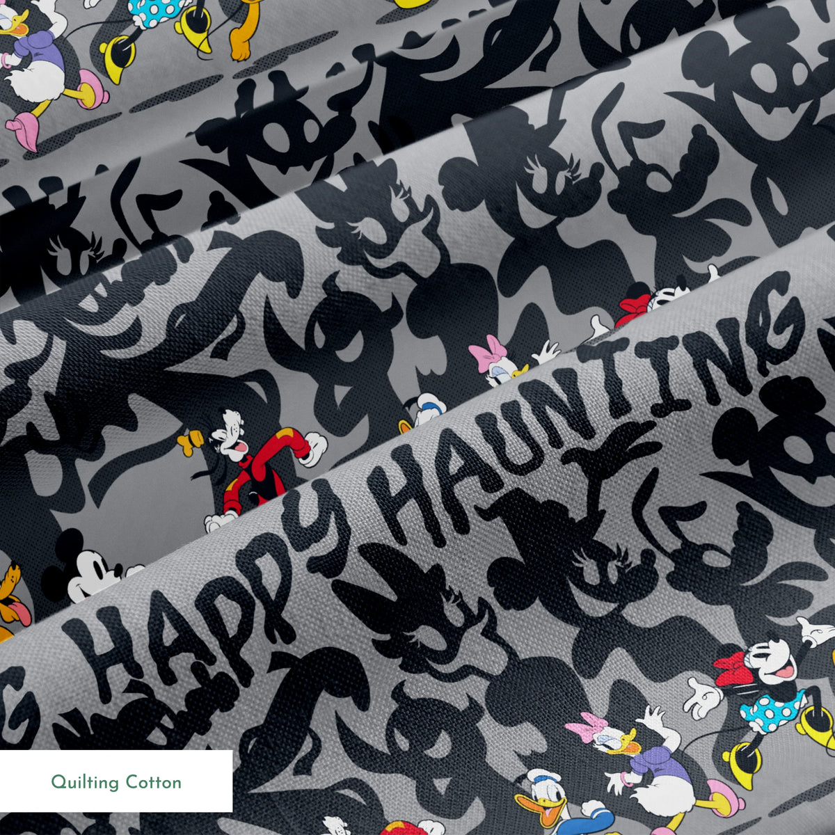 Classic Disney characters on dark gray background with "Happy Haunting" text, Mickey, Donald, and friends in Halloween-themed poses. springs quiltingcotton texture