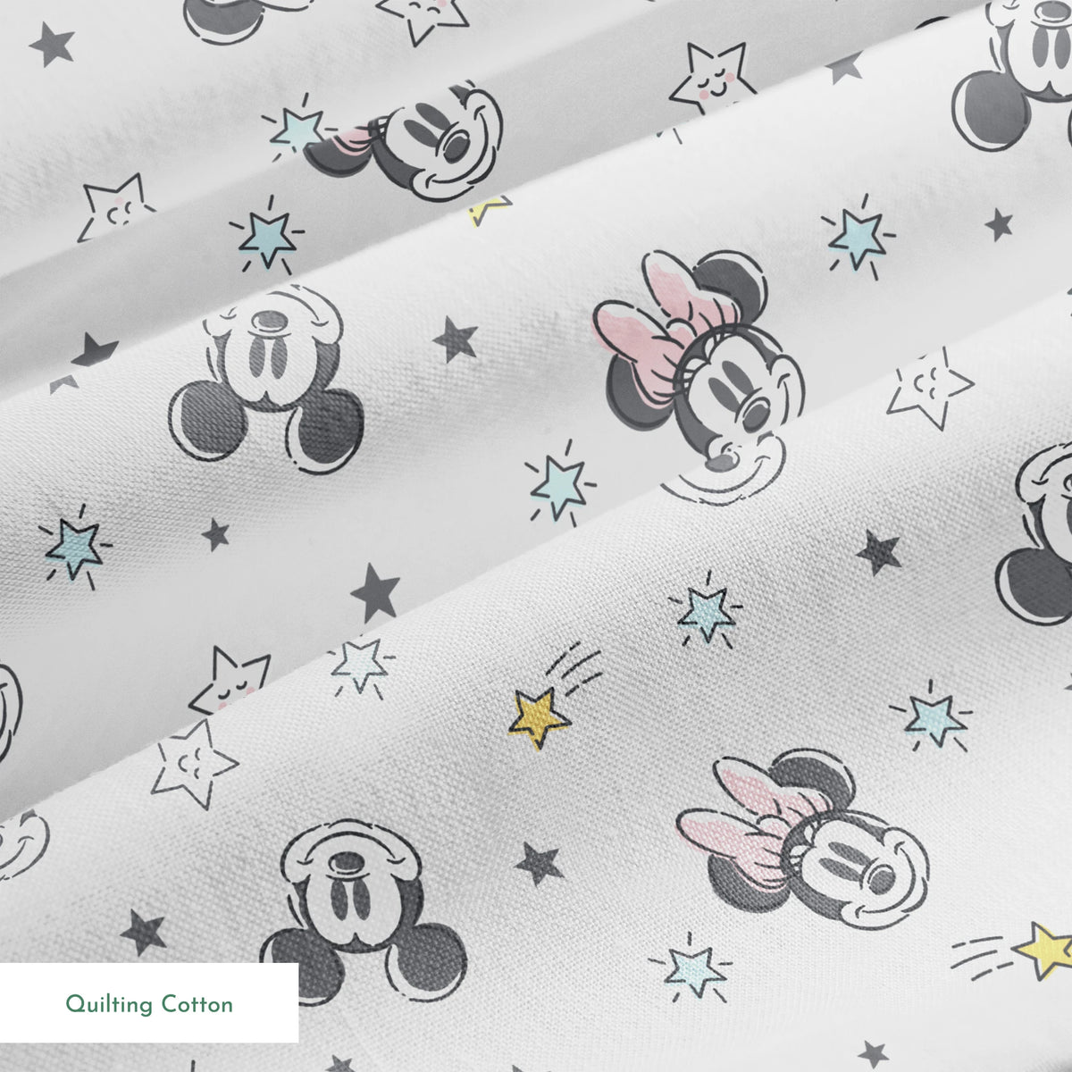 Mickey and Minnie Mouse pattern with stars on light gray background springs quiltingcotton texture