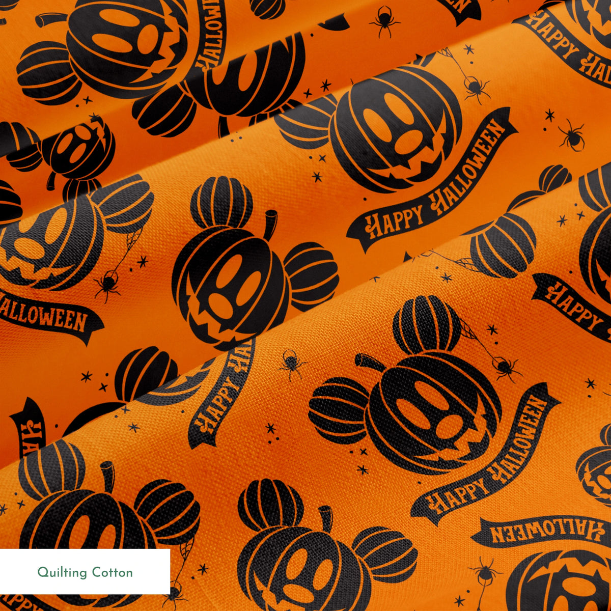 Halloween pattern with Disney-inspired jack-o'-lantern pumpkins and "Happy Halloween" text on bright orange background springs quiltingcotton texture