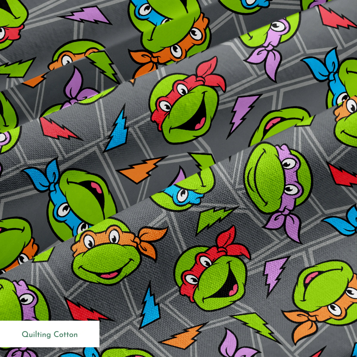 Colorful pattern of Teenage Mutant Ninja Turtles faces with red, orange, blue, and purple masks on grey background. springs quiltingcotton texture