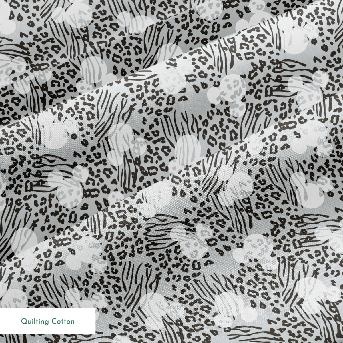 Animal print pattern with zebra stripes and leopard spots in black and white on gray background springs quiltingcotton texture