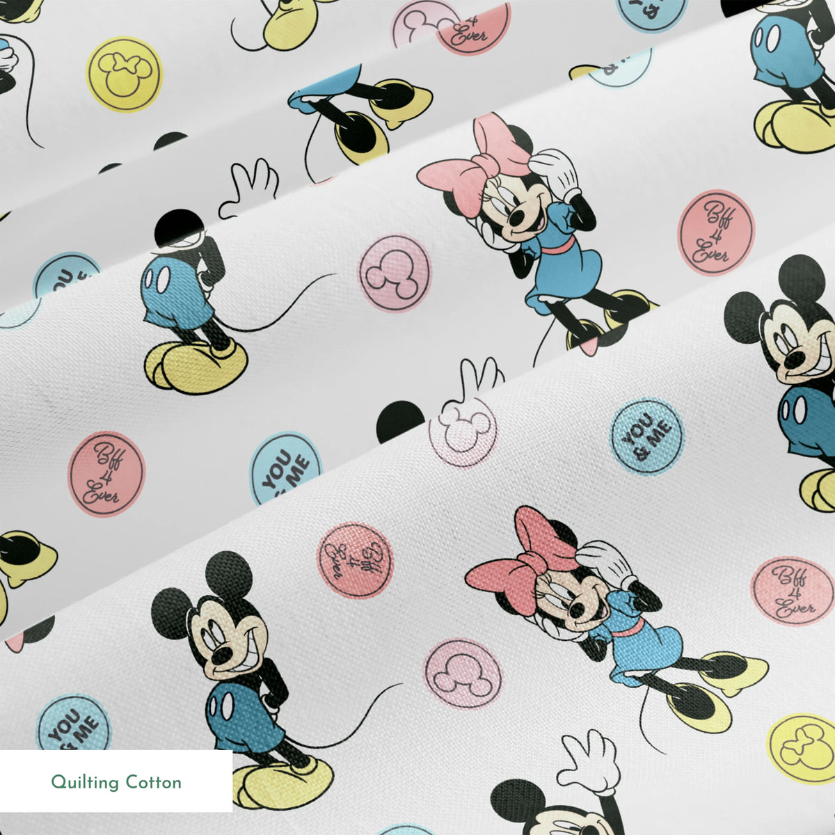 Mickey Mouse and Minnie Mouse cartoon pattern with colorful circles containing phrases on white background. springs quiltingcotton texture