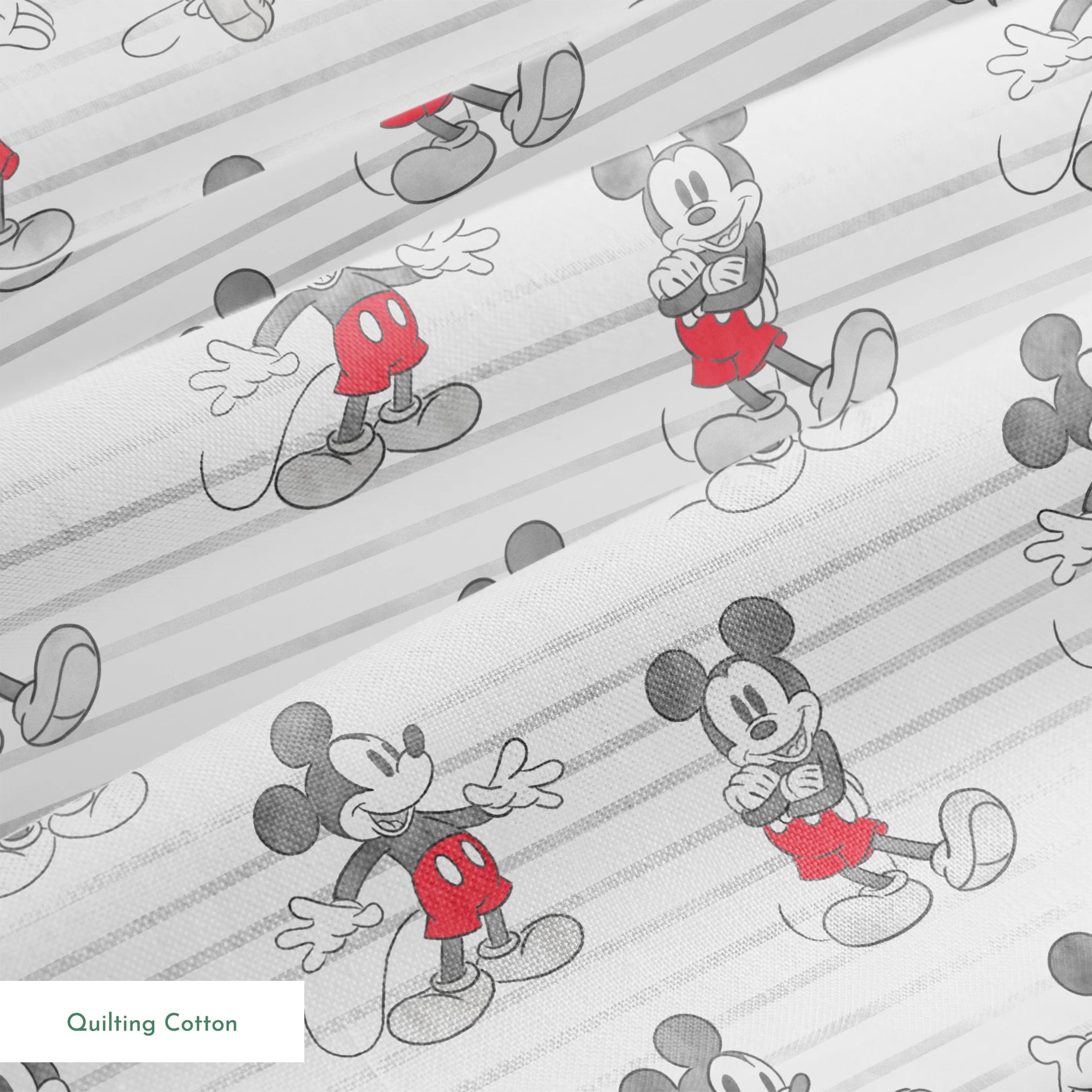Mickey Mouse cartoon characters in various poses on gray and white striped background springs quiltingcotton texture