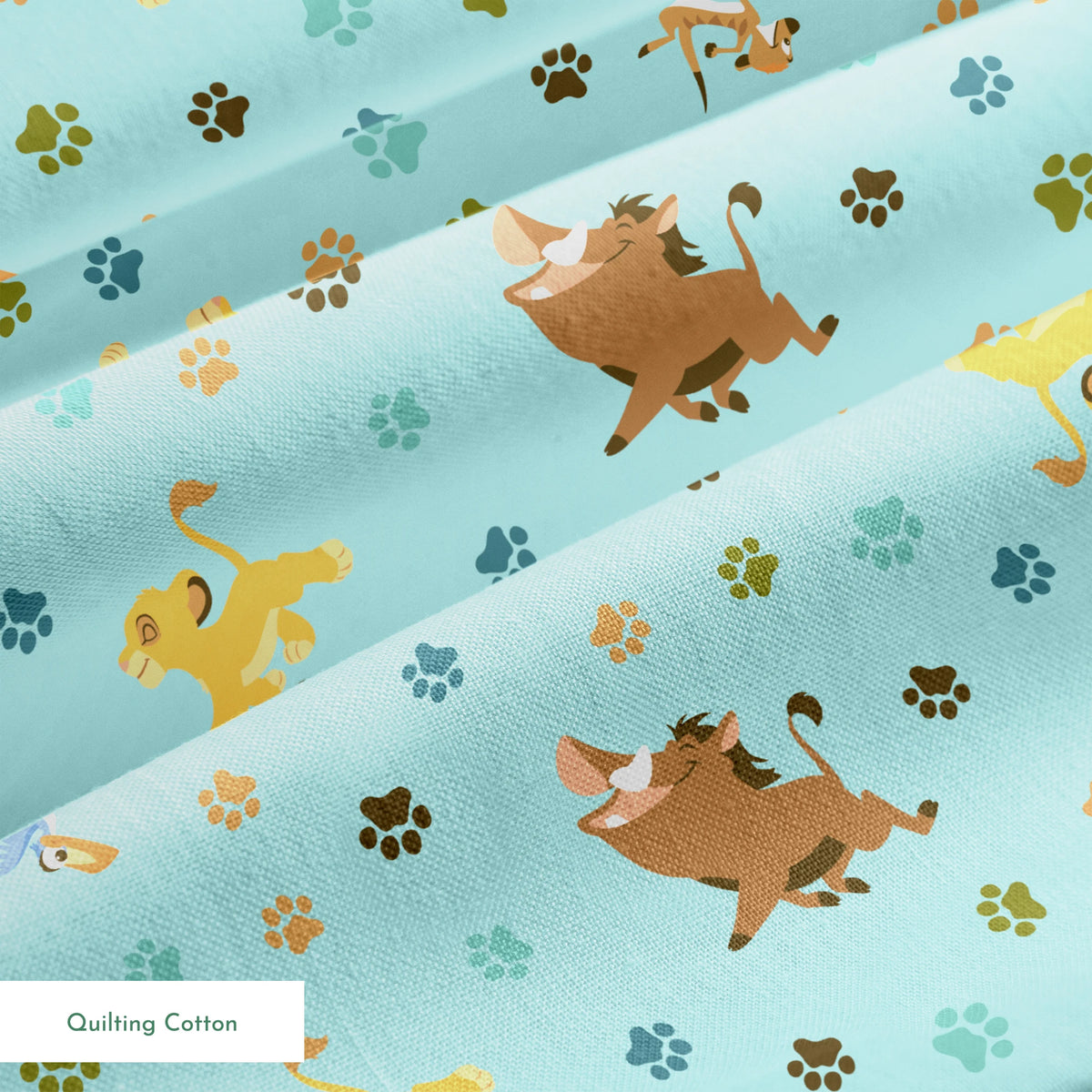 The Lion King pattern with paw prints on light blue background springs quiltingcotton texture