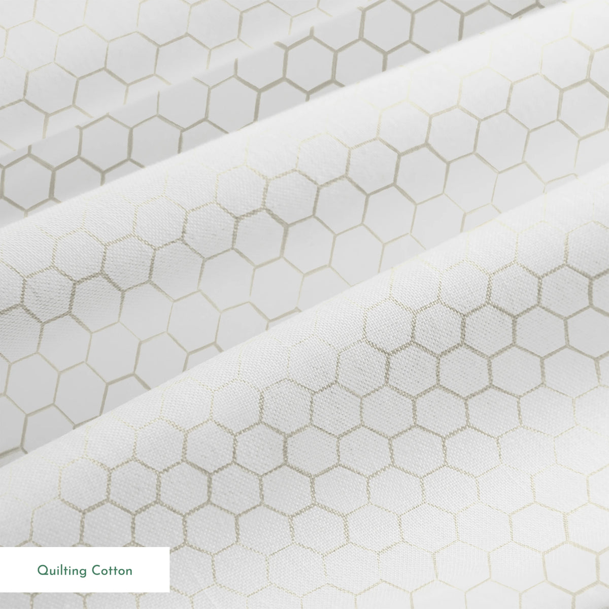 White and beige honeycomb pattern fabric designed by Nicole Tamarin with a subtle, modern farmhouse style. springs quiltingcotton texture