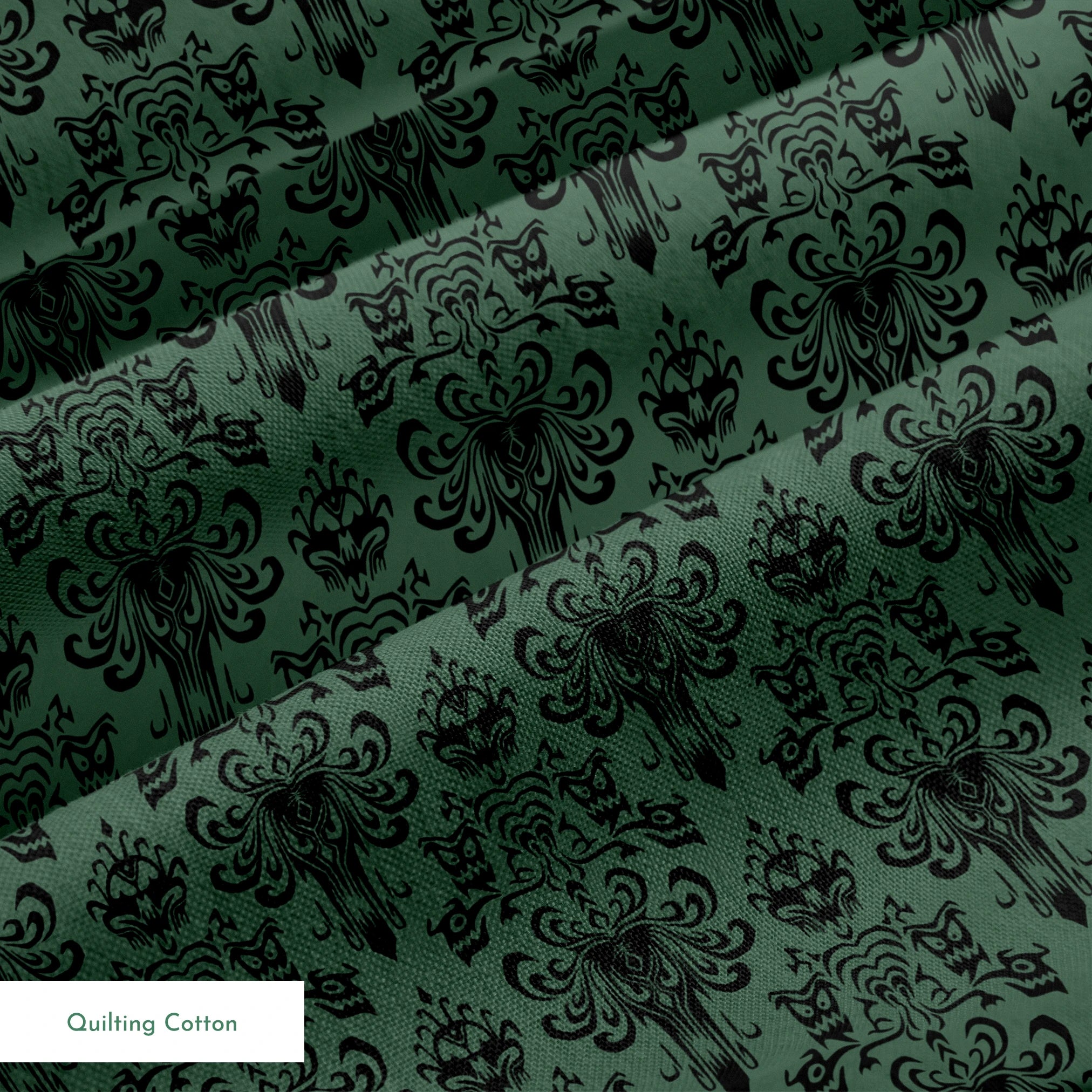 The image shows an elegant Victorian or Gothic-style damask pattern in black against a dark green background. The repeating ornate design features intricate scrollwork, flourishes, and symmetrical decorative elements arranged in a traditional wallpaper or textile pattern style. springs quiltingcotton texture