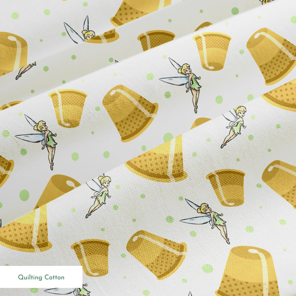 A pattern featuring Tinkerbell fairy with golden thimbles on a pale background with green dots. springs quiltingcotton texture