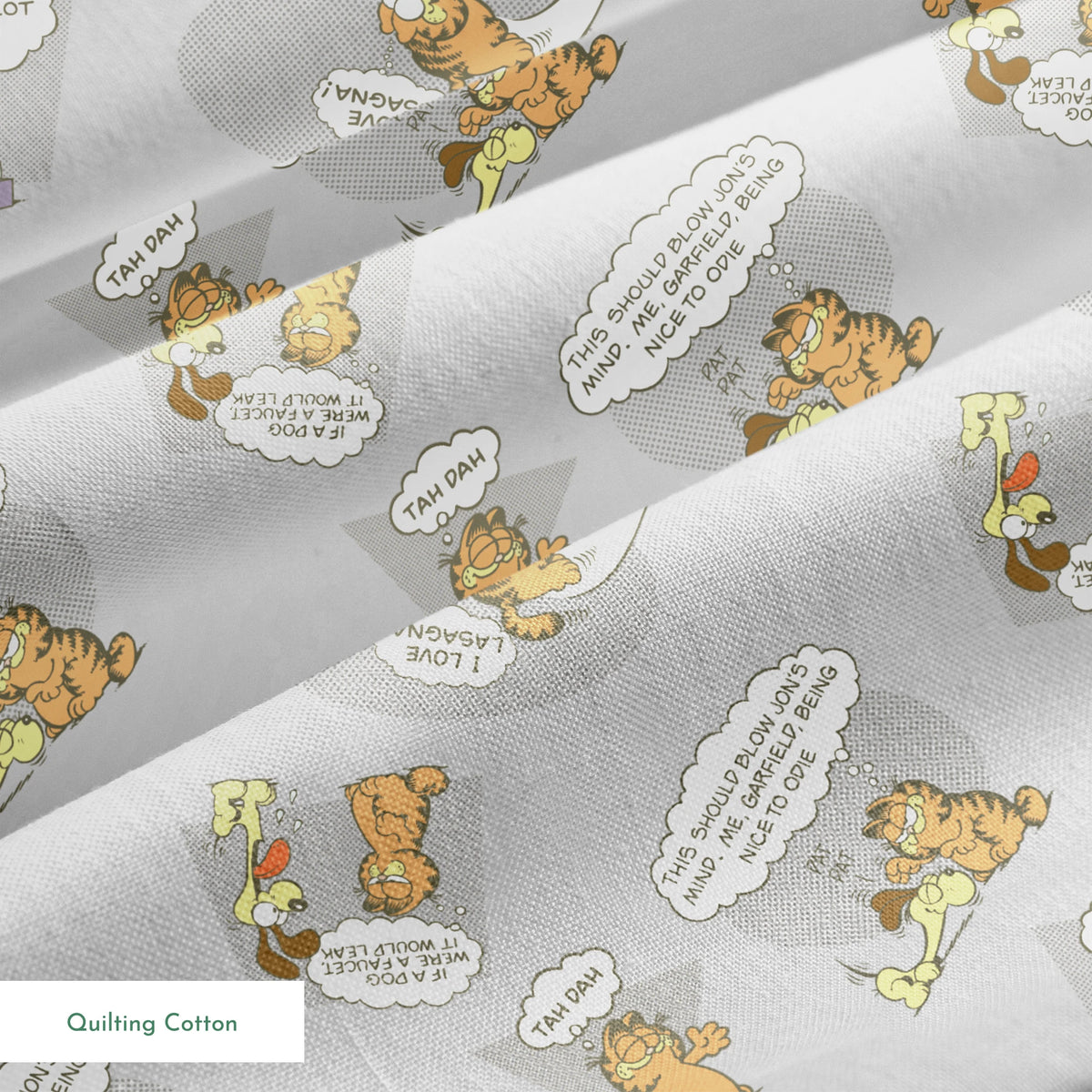 Cartoon Garfield pattern with various poses of the orange cat and speech bubbles on gray background springs quiltingcotton texture